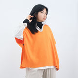 Sleeveless V-neck poncho in soft knit YF67035