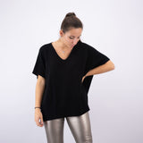 Sleeveless V-neck poncho in soft knit YF67035