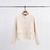 Short cardigan with mother-of-pearl buttons and frayed edges HY11057