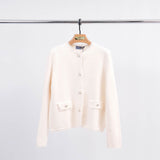 Short cardigan with mother-of-pearl buttons and frayed edges HY11057