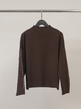 Pull en maille ample à col montant, manches ornées DSY9774