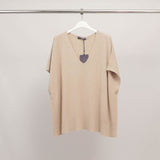 Sleeveless V-neck poncho in soft knit YF67035