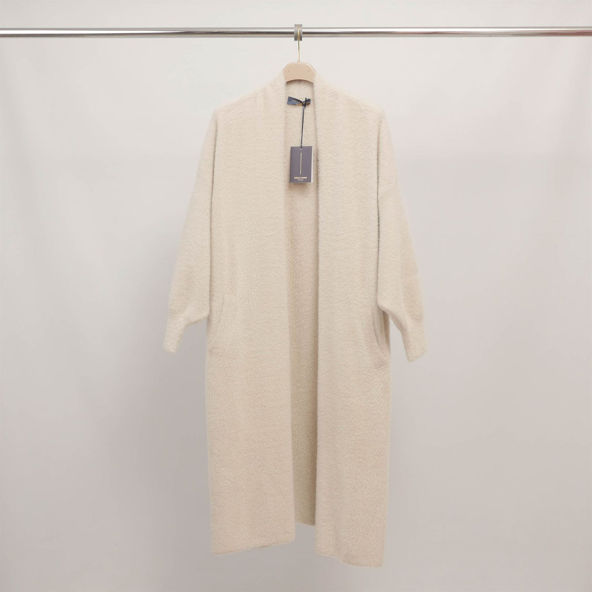 Long, fluffy knit coat without a zipper dsy2128