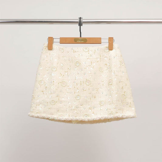 Jupe courte en tweed brodé MJ260597