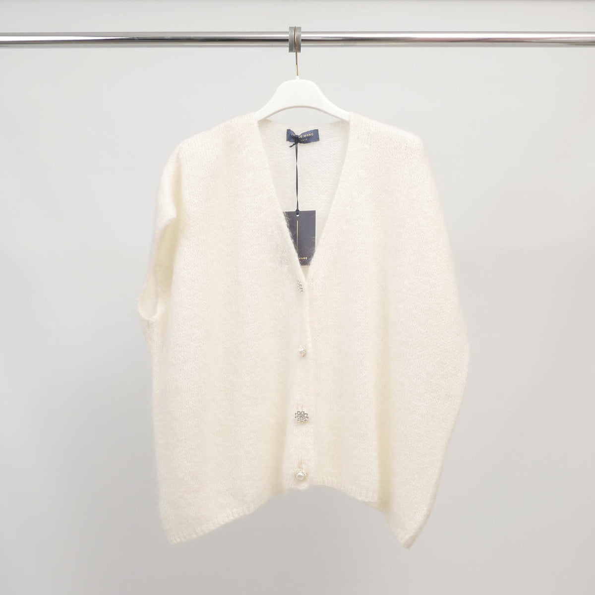 Sleeveless fluffy knit vest with jeweled buttons   mcl24002