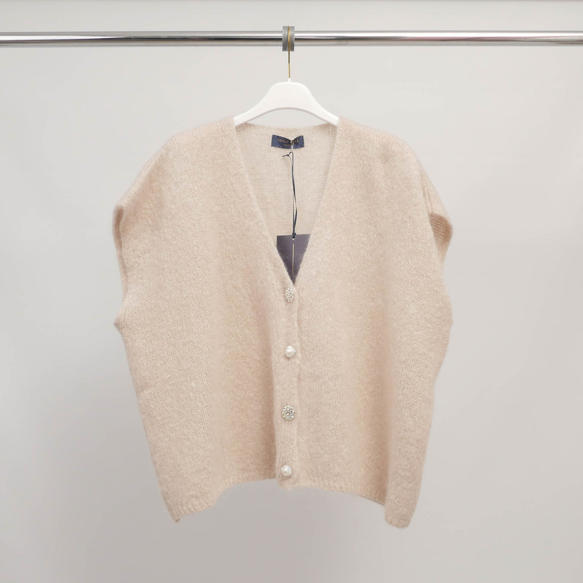 Sleeveless fluffy knit vest with jeweled buttons   mcl24002