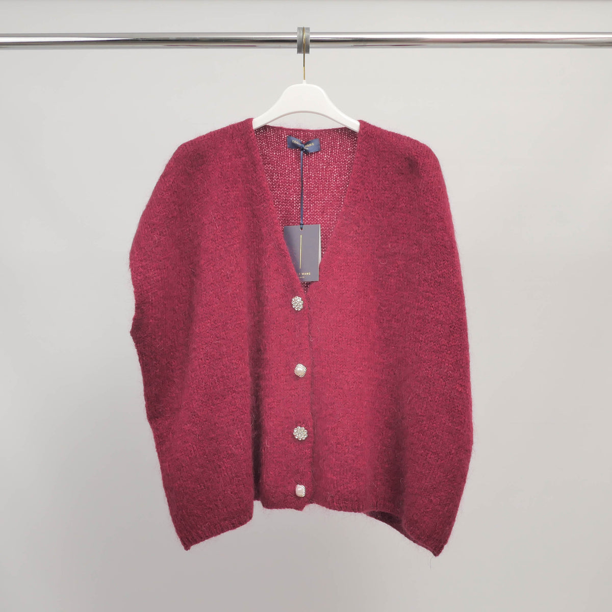 Sleeveless fluffy knit vest with jeweled buttons   mcl24002