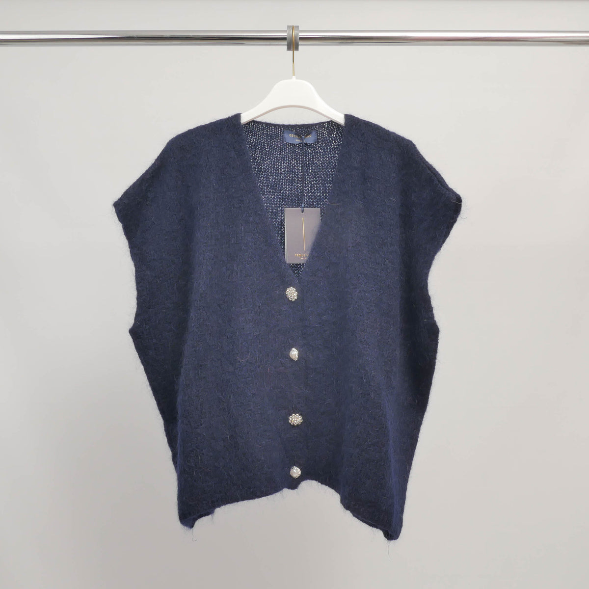 Sleeveless fluffy knit vest with jeweled buttons   mcl24002