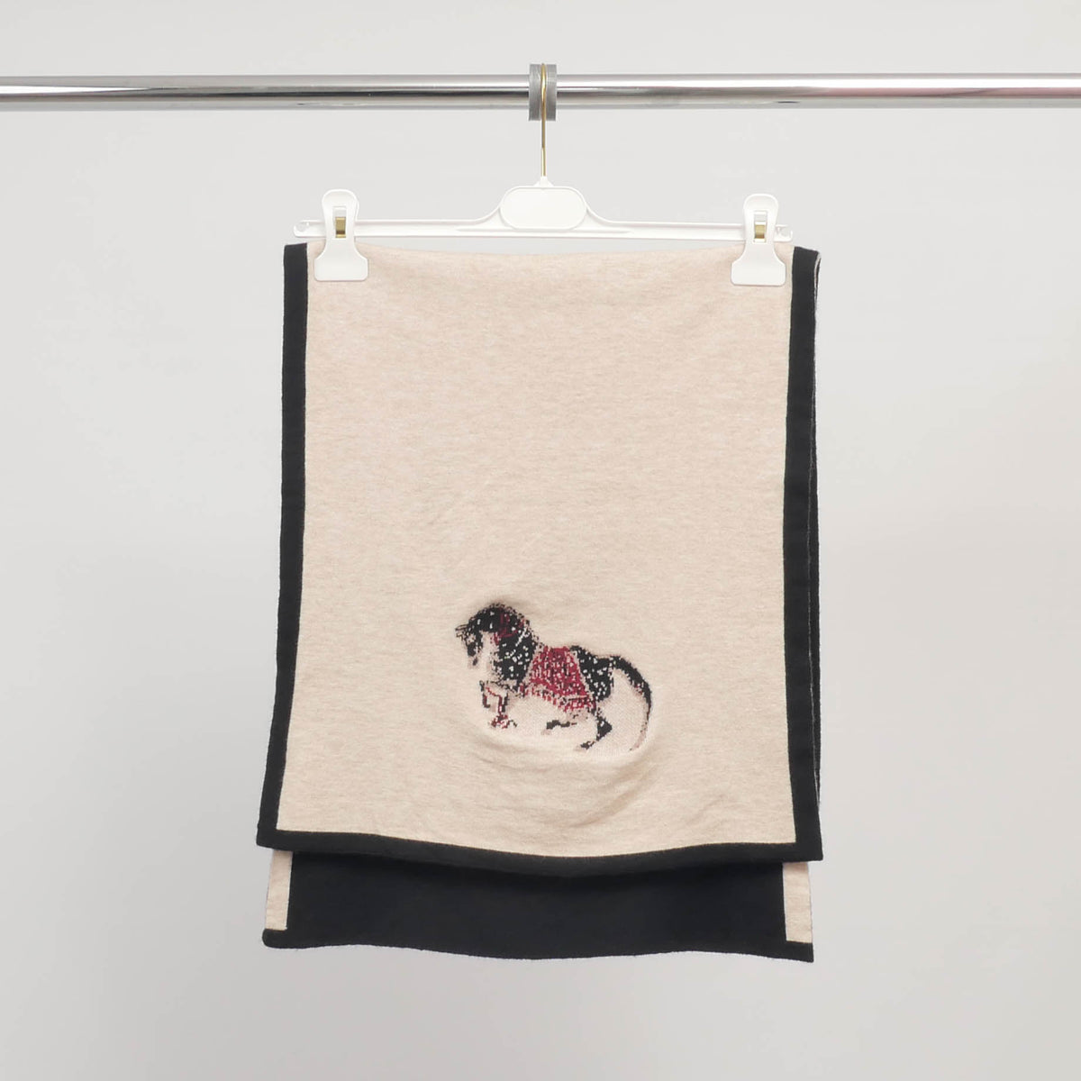 Two tone knitted scarf with horse motif msj76931