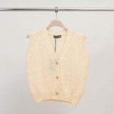 Sleeveless mohair knit vest with jeweled buttons – CA10543
