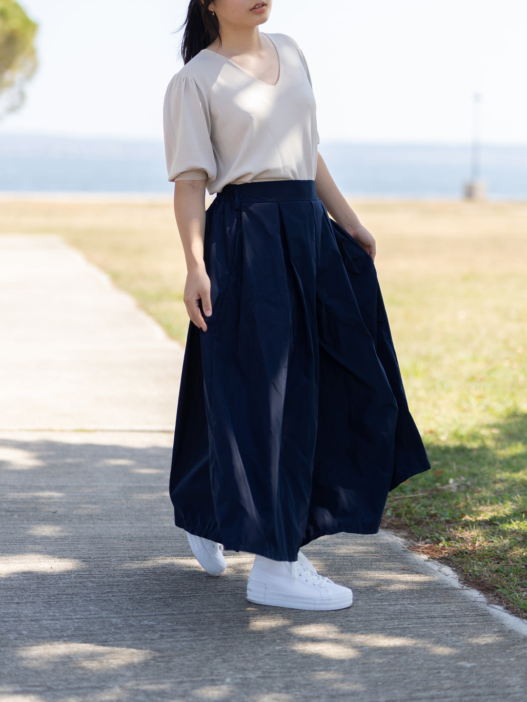 Pleated waterproof midi skirt – HM4547