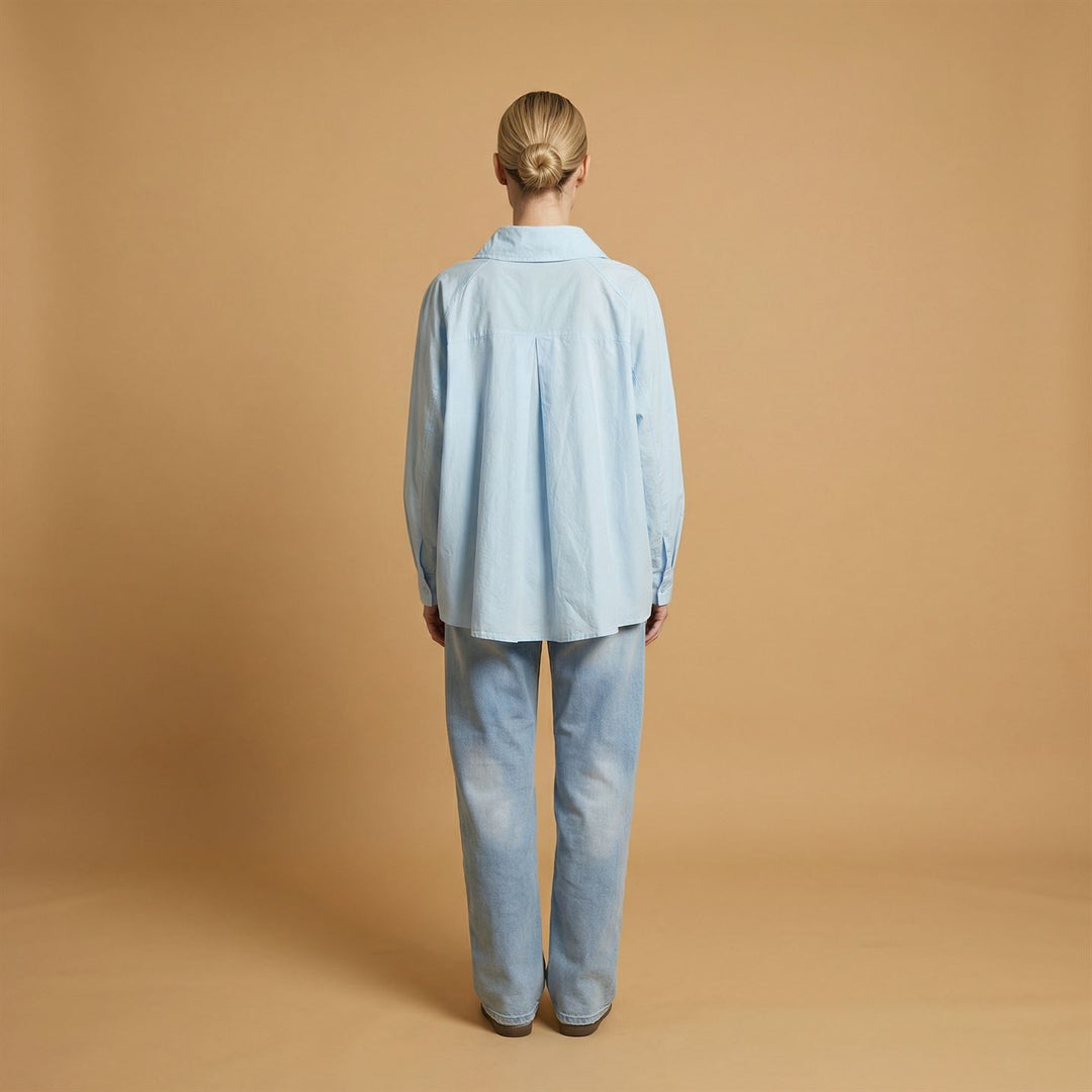 Cotton shirt with asymmetrical buttoning db14916