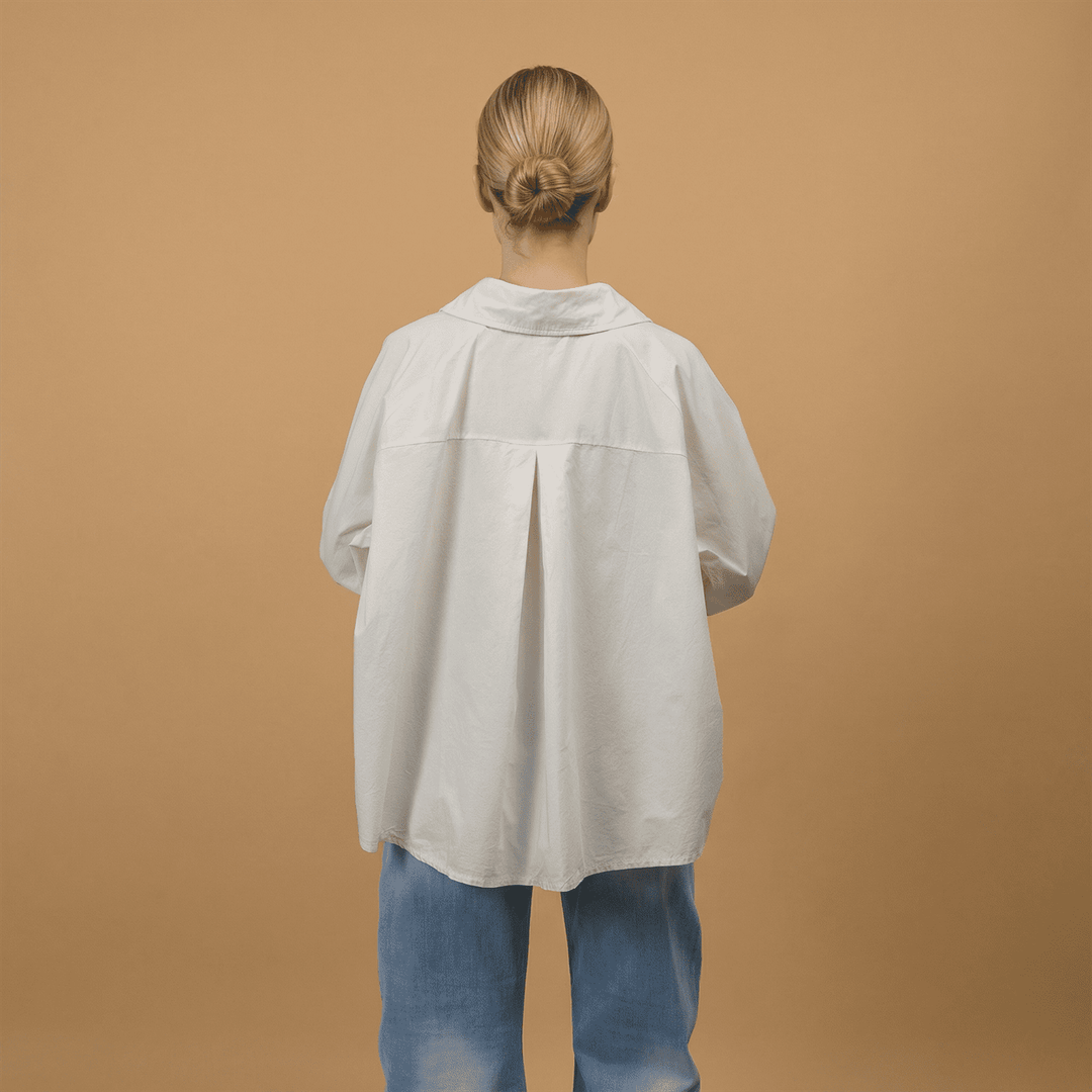 Cotton shirt with asymmetrical buttoning db14916