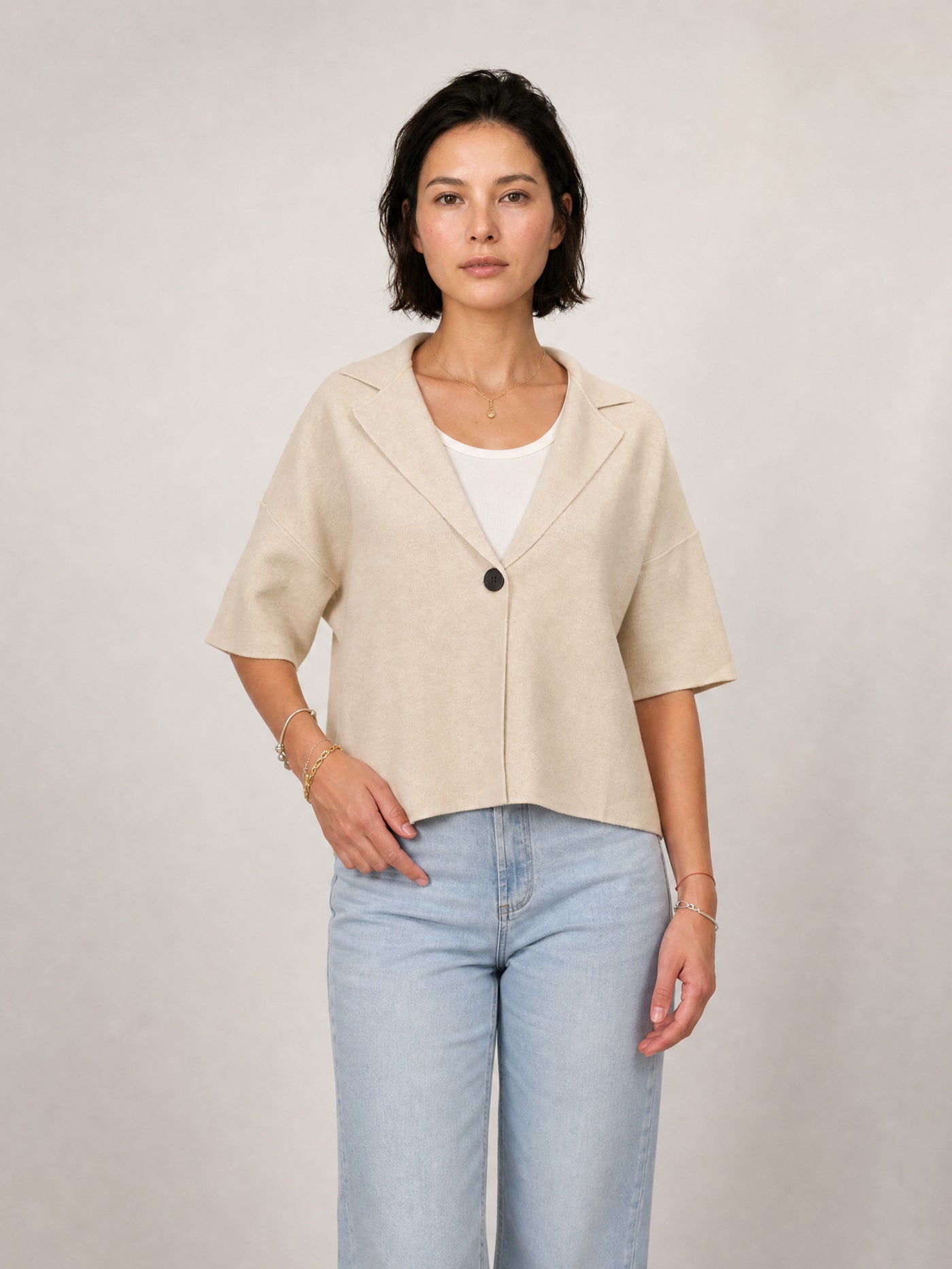 Veste en maille ample à revers et manches courtes HY26039