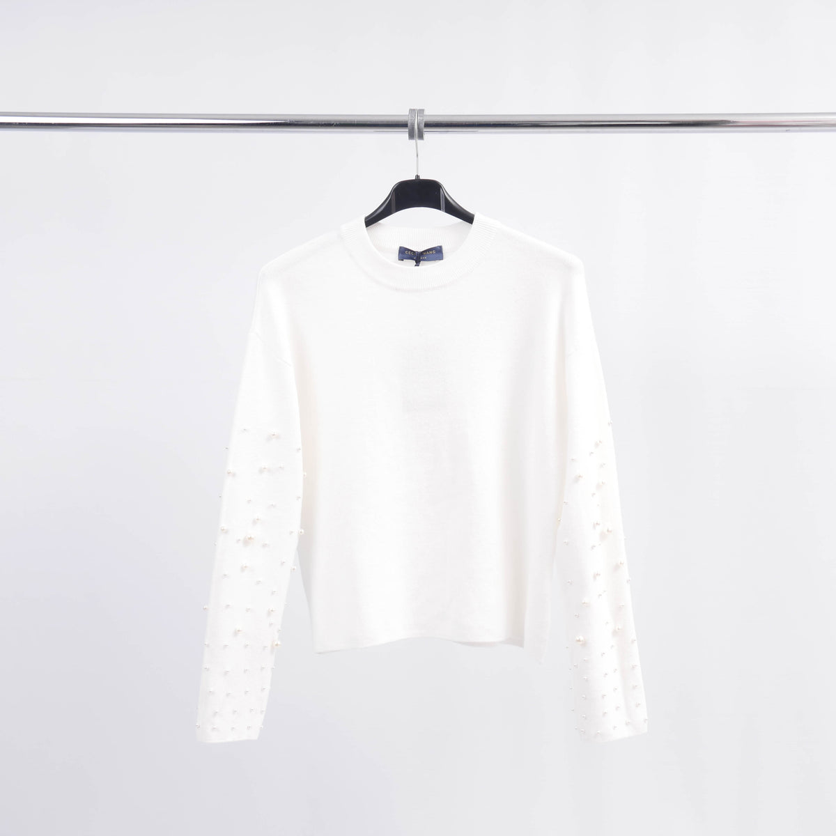 Round neck sweater with pearls on the sleeves dsy24226