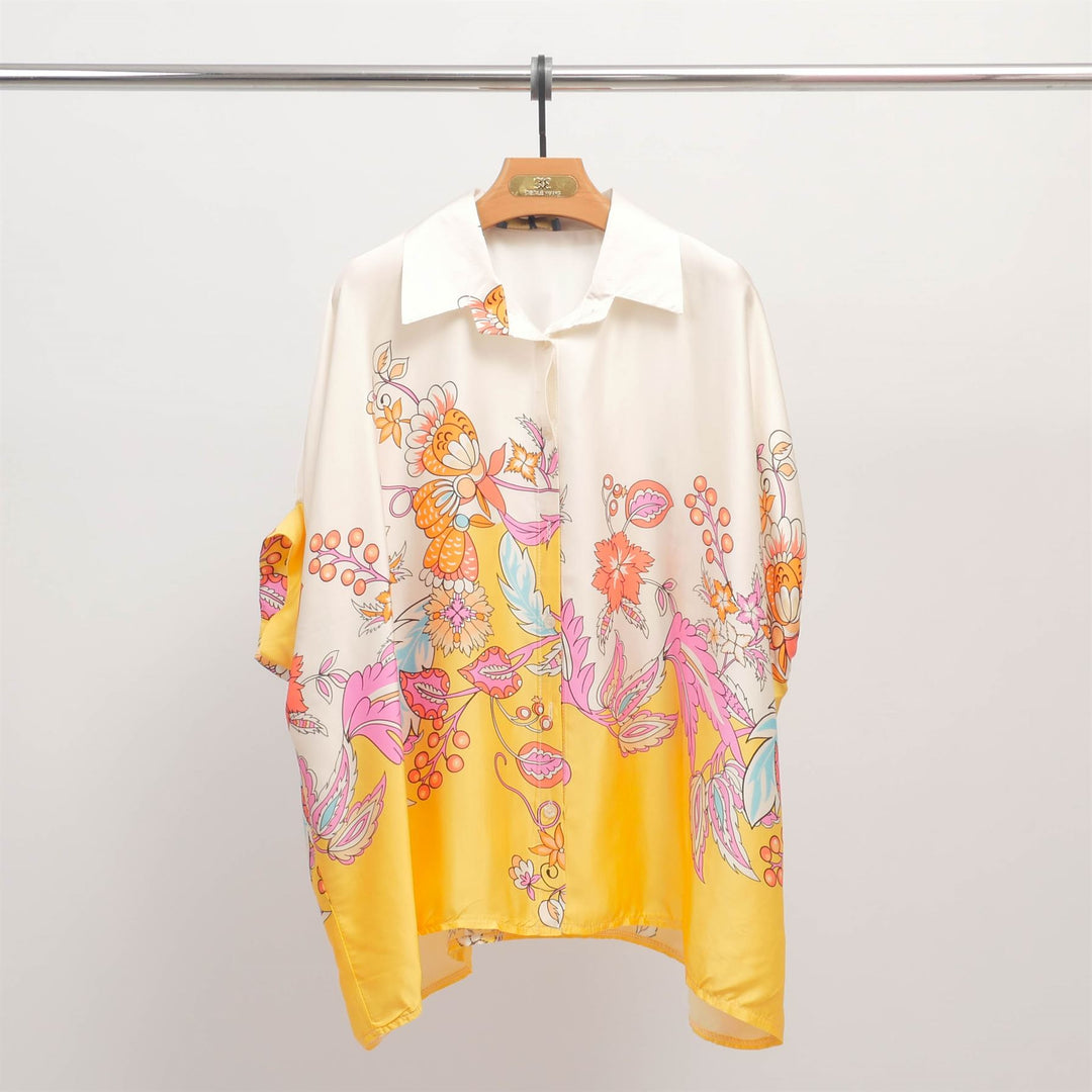 Loose-fitting blouse with floral print on a yellow background and a shirt collar KD8758VS-18