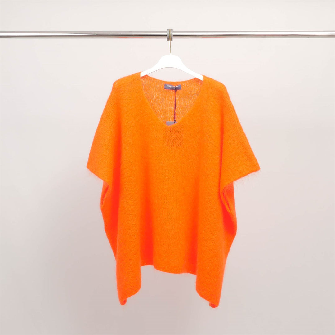 Oversized V-neck knitted poncho MCL24036