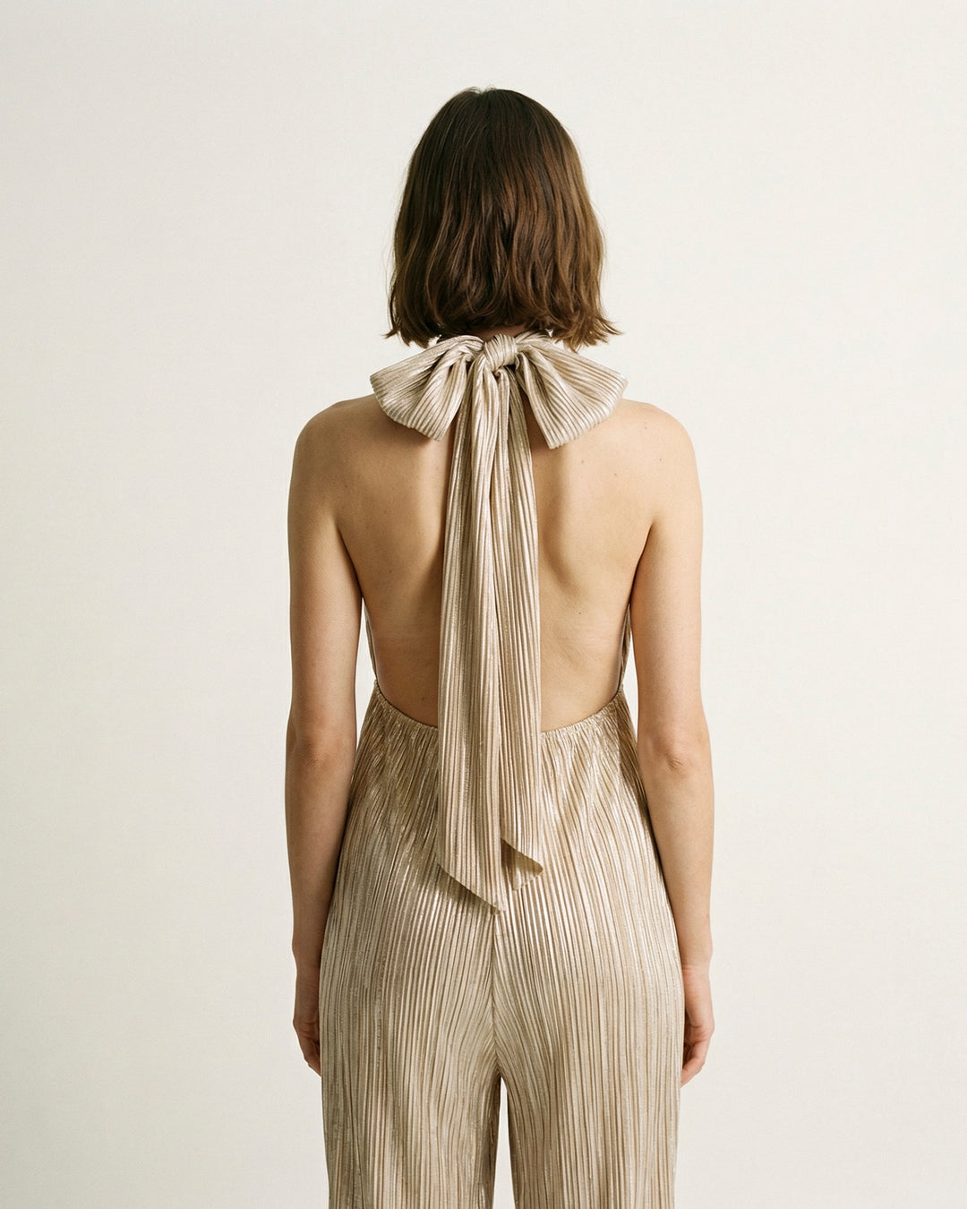 Sleeveless pleated jumpsuit with a fluid cut TDM20123-2